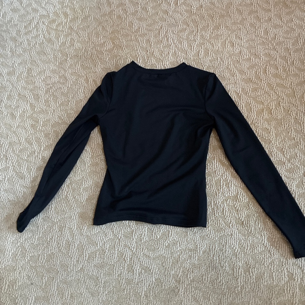 Woman’s black top